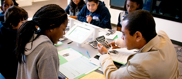 A mentor teaching a class of students